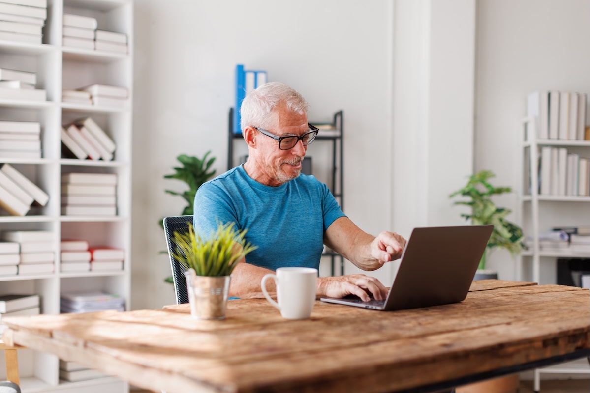 High-income professional reviewing finances, demonstrating strategies for managing unpredictable earnings, reducing tax exposure, and aligning wealth planning with long-term goals.